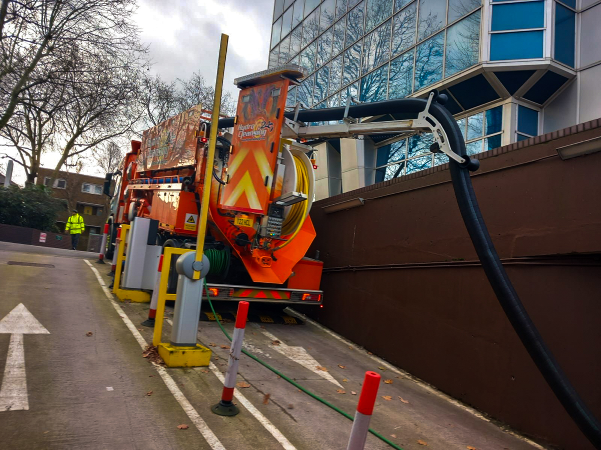 Industrial tanker removing oily water from a construction site
